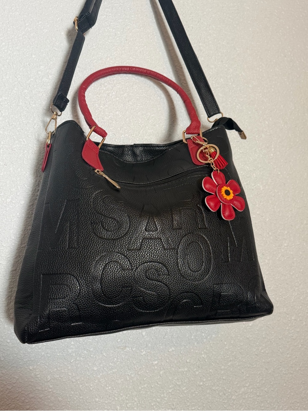 Black Tote Bag/ Purse with Red Handles and Flower Charm included free.